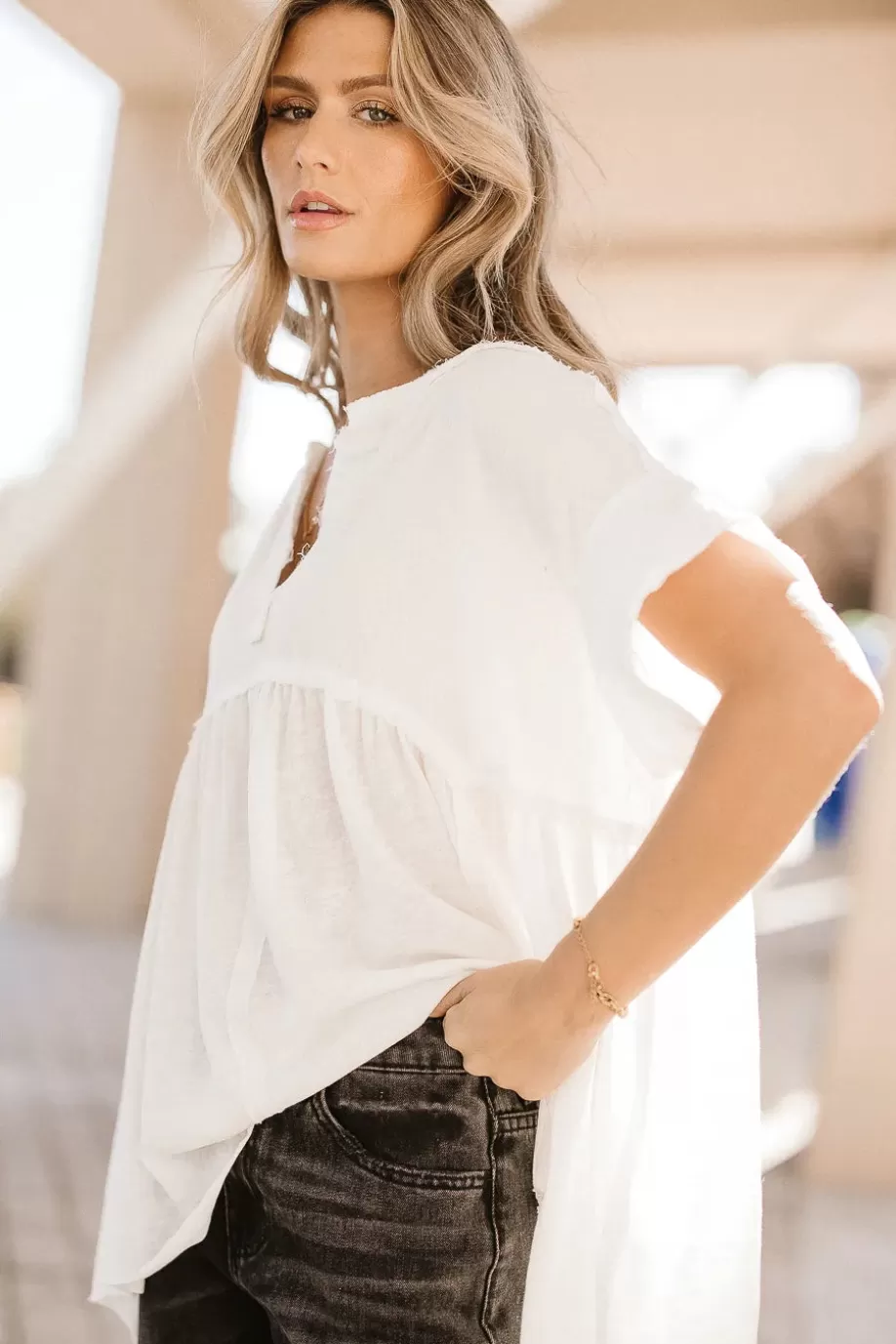 Shop Niki Exposed Seam Top in TOPS